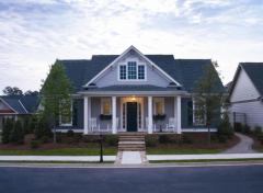 Minor setback: Houses at Somerset are pulled close to the street (14 feet from the curb) to encourage neighborly interaction. The Hamilton plan (shown here) features a wide front porch and rear-loaded garage.