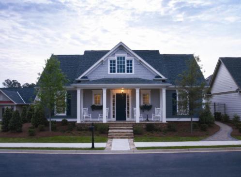 Minor setback: Houses at Somerset are pulled close to the street (14 feet from the curb) to encourage neighborly interaction. The Hamilton plan (shown here) features a wide front porch and rear-loaded garage.