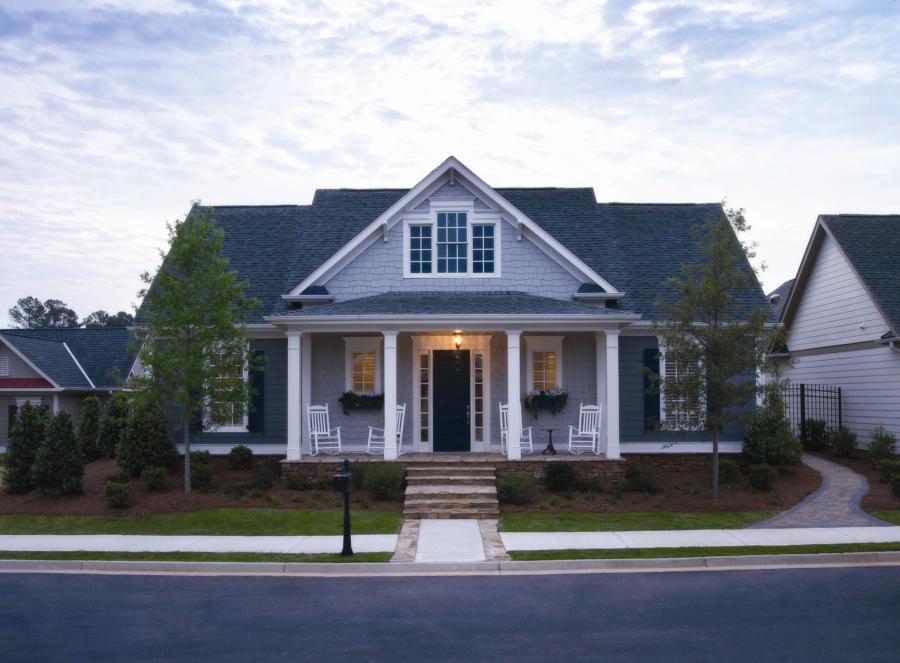 Minor setback: Houses at Somerset are pulled close to the street (14 feet from the curb) to encourage neighborly interaction. The Hamilton plan (shown here) features a wide front porch and rear-loaded garage.