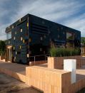 Term Germany's surPLUS house features 250 thin-film copper indium gallium diselenide panels enveloping its facade, providing an eye-catching architectural look while generating solar energy. 