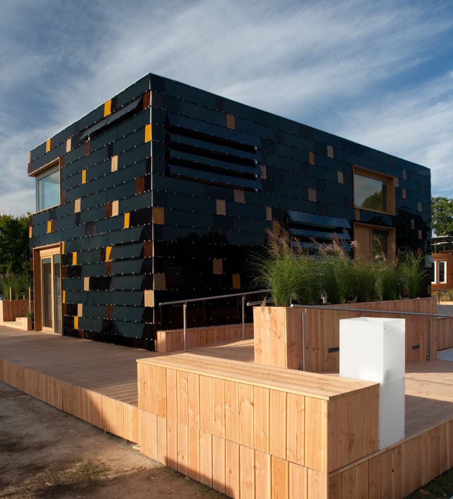 Term Germany's surPLUS house features 250 thin-film copper indium gallium diselenide panels enveloping its facade, providing an eye-catching architectural look while generating solar energy. 