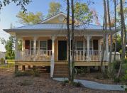 The Bay St. Louis, Miss., house was built to LEED-Platinum standards with 95% volunteer labor and will serve as a model for other high-performance Habitat homes.