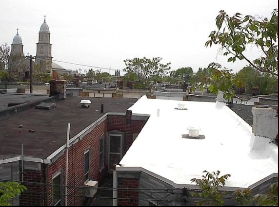The city says a white roof reflects heat and keeps houses cooler.