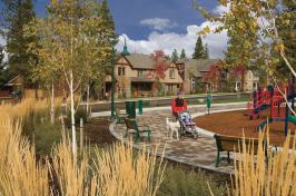 EVERGREEN: Preserving most of the mature pine trees and weaving roads (and some rooflines) around them, NorthWest Crossing has achieved its goal of sustained success.