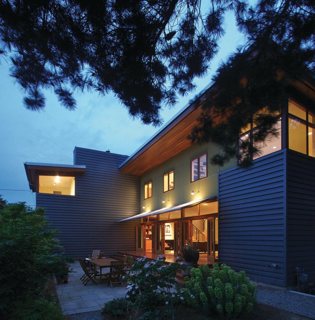 A Lot of Use: What looks like a single-family home on the outside is actually two residences, each with its own private entry and patio space.