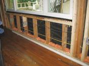When contractor James Pader removed the wallboard on this 1959 cabin, he could see the gaps that caused air leakage in the original structure. He sealed gaps and cracks with expandable foam and furred out the existing 2x4 framing to 2x6 to create a 5 1/2-inch cavity for fiberglass insulation to create an R-value of 19.
