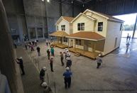 Preparing for the Worst: Two full-sized houses were built inside the Institute for Business and Home Safety's new research center that can recreate weather "events" to see how well building materials hold up.