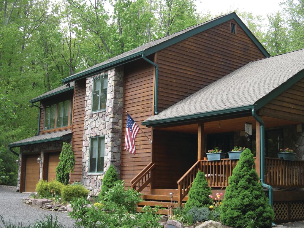 EXPLOITING SYNERGIES: Sharing office space with a rustic furniture supplier has given Rinehimer Construction a better shot at customers interested in matching that furniture with construction or renovation that includes log and rail components.