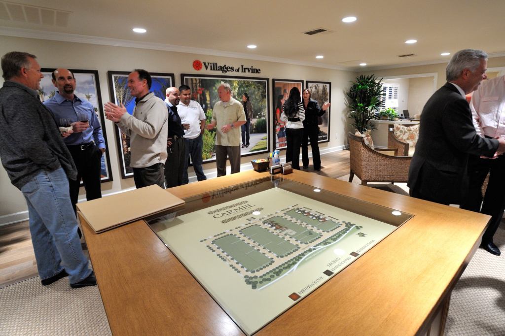 DRAWING A CROWD. The Irvine Company is offering its 2010 New Home Collection of 25 houseplans in eight of its neighborhoods, including “Carmel,” whose single-family detached houses are being built by The New Company, a startup.