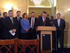 Senator Michael Bennet (D-Colorado) announced the SAVE Act on Oct. 19, in Washington, D.C. Senator Johnny Isakson (R-Georgia), co-sponsor of the bill, is to his left.