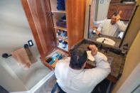 Designed Within Reach

Dennis Mason has used a wheelchair since he lost his legs in the Vietnam War. His natural athleticism allowed him to navigate a standard bathroom for many decades. Now in middle age, Dennis, along with his wife, Juliette, asked Dean Johnson of Green Construction Services, in Lakeland, Fla., to help them reconfigure the space last year. The new bathroom includes a sink and counter set at 34 inches above the finished floor that Dennis can roll his chair up to, along with a wall mirror that tilts at an angle to suit his needs. Handy shelves and drawers beside the sink solve the storage problem that often plagues accessible sink set-ups.