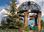 Tuscan Garden Works offers hand-wrought iron gazebos with swings.