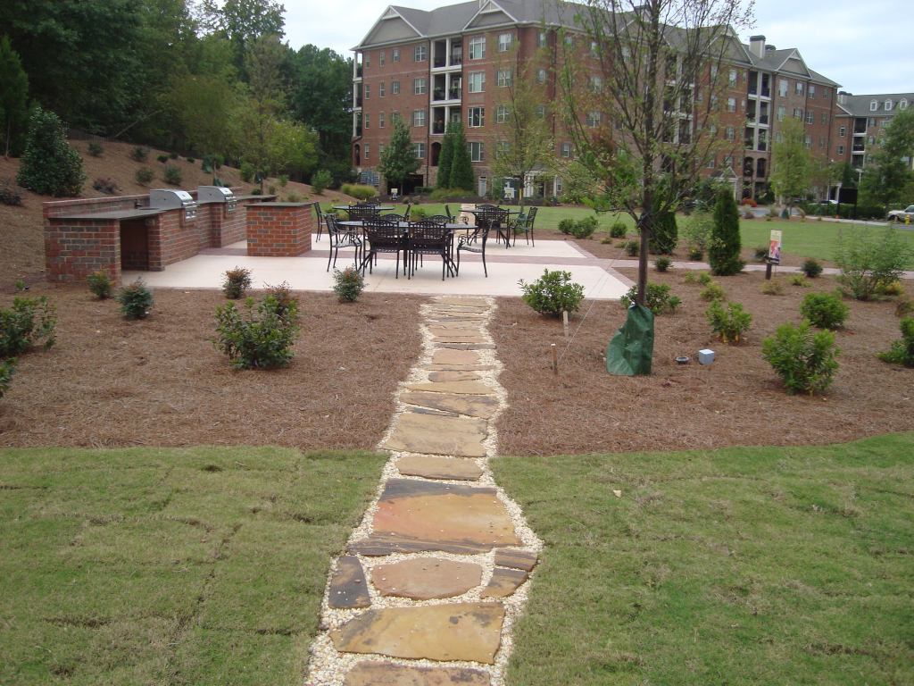 ALFRESCO AMENITY: An open-air dining area is now part of the Sterling at Dunwoody condo complex, whose developer, The Providence Group, chose to install a community park where a fifth building was originally intended.