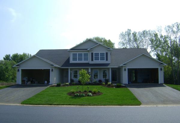 The duplex features one finished and one unfinished side.