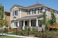 Shea Homes' Esplanade model at Mountain House (above) includes an alley-loaded garage. The house plans range from 2,500 to 2,800 square feet and start in the low $300s. The best-selling model in this community is Meritage's Americana (below), which starts at 1,870 square feet and is available for less than $300,000.