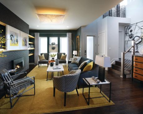 Black bricks lend a horizontal feel to the family room’s hearth area.