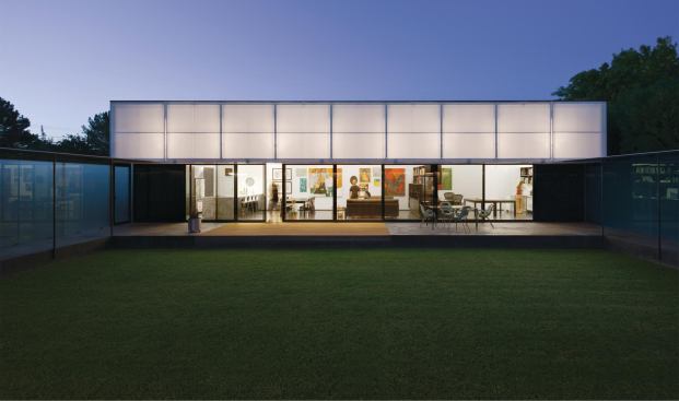 When lifted, the live/work pavilion's operable polycarbonate awning becomes a giant lantern.