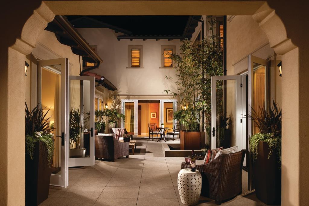 Compound Interest At Lambert Ranch in Irvine, Calif., two houses face each other with a courtyard in between. It’s one residence with room enough for three generations.