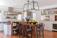 The main kitchen strikes a comfortable balance between refinement and utility. Stainless steel "boots" protect the kickspace's outside corners.