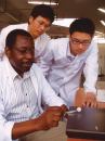 Timed Capsule Professor Darkwa (left) and research assistants examine phase-change material they’ve engineered to store and release a room’s excess heat.