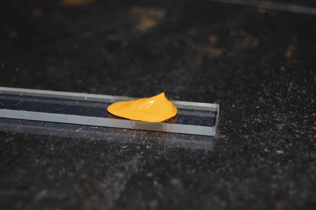 A Little Dab'll Do Ya A yellowish semiconductive paste swabbed onto a glass electrode has converted at least 1 percent of the light hitting it into energy.