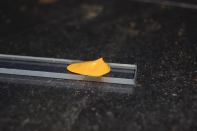 A Little Dab'll Do Ya A yellowish semiconductive paste swabbed onto a glass electrode has converted at least 1 percent of the light hitting it into energy.
