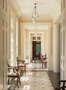 Sight lines from interior to exterior help relate the home to the surrounding farmland, while high ceilings and wide openings give it a graceful, stately air.