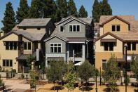 D.R. Horton was able to build these37 alley-loaded homes, ranging in size from 2,259- to 2,312-square feet, for $92 a square foot.