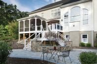 Sun Design’s Craig Durosko says that landing areas at different levels are more inviting than one tall staircase to the yard.