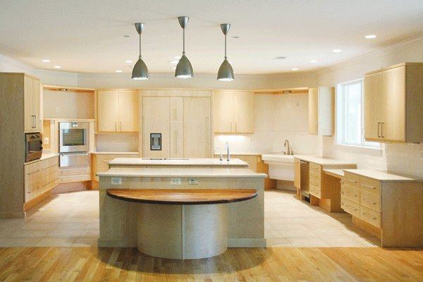 Accessibility is key in this universally designed kitchen where multi-level countertops and high toe kicks allow seated users to move closer to work surfaces.