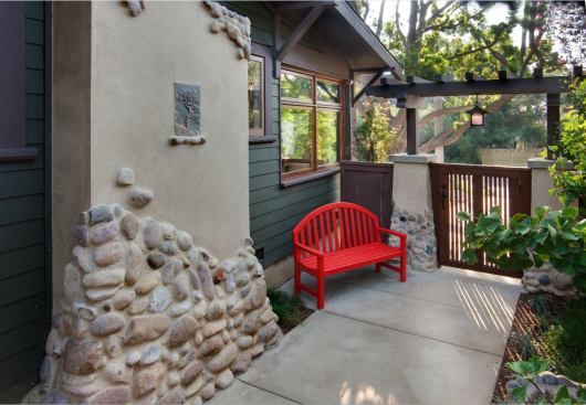 The stonework wasn't original to the house, but takes its cues from the iconic houses of the Greene Brothers.
