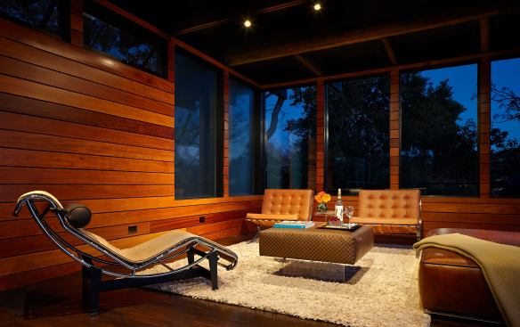 The second level is small but efficient and includes space for entertaining.