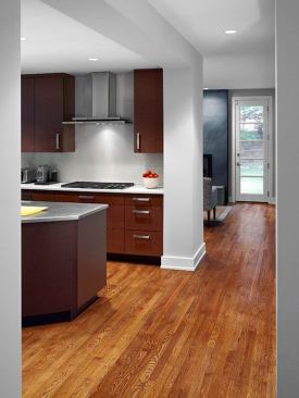 From the cook's spot at the main island are views directly into the living room.
