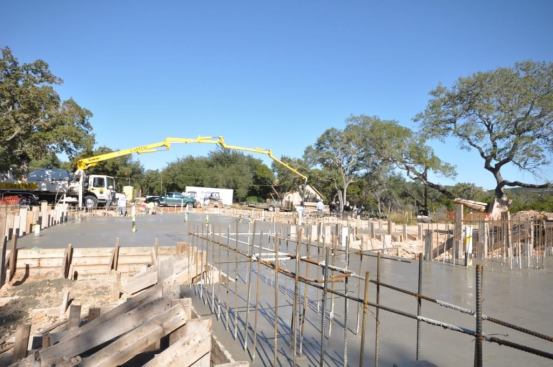 Lots of rebar sticking up through the slab to incorporate into the future board-formed concrete house walls.