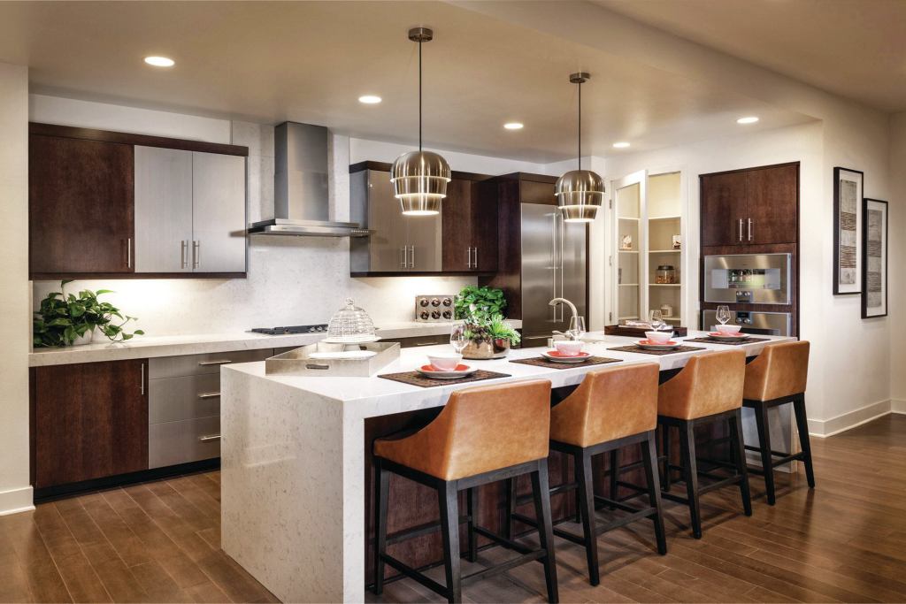 Hub of the House KTGY's work on KB Home's Skylar at Playa Vista in Los Angeles features "super kitchens" that cater to entertaining, dining, and conversation.