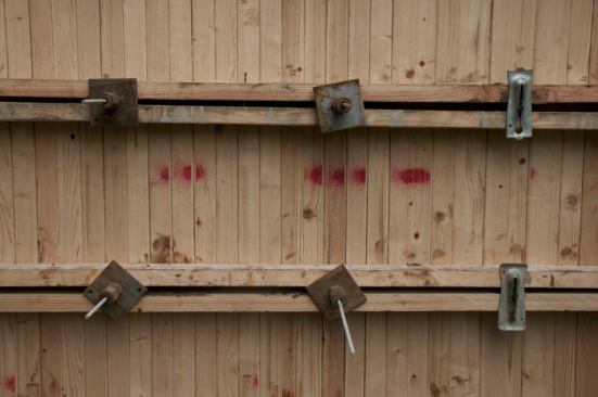Fiberglass wall ties on your left and Metal ties on your right. We tested both on a mockup wall.