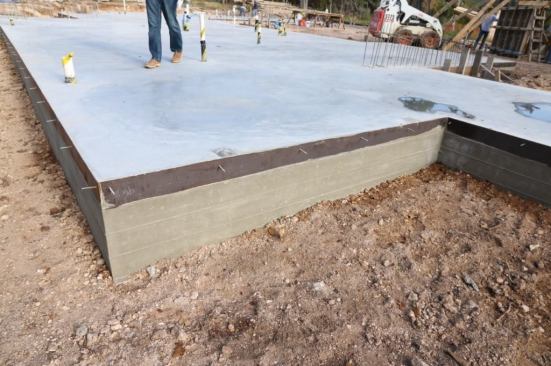 Notice the Metal bands set into the slab? These will be part of the future site-built windows!