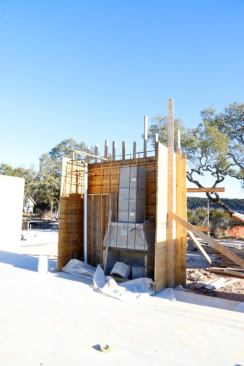 Main family room fireplace inside a board formed wall. We used an Isokern masonry insert.