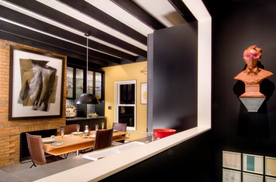 While a striking black-and-white ceiling adds drama to this kitchen and dining area, cheerful yellow walls add a welcome contrast and a spacious feel.

Architect: Reader & Swartz Architects, Winchester, Va.

Builder: Lodge Construction, Winchester