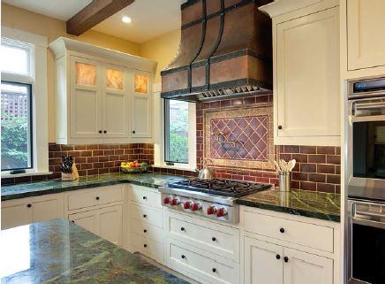 The vent hood was custom built of hammered copper, a hat-tip to Craftsman-era metalwork.
