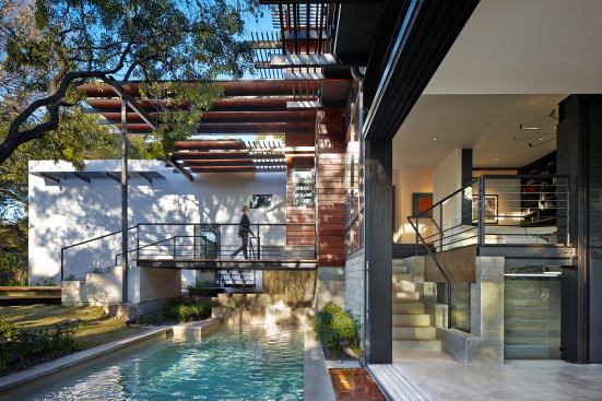 With water at a premium, this pool serves as fountain, relflecting pool, and waterwall.