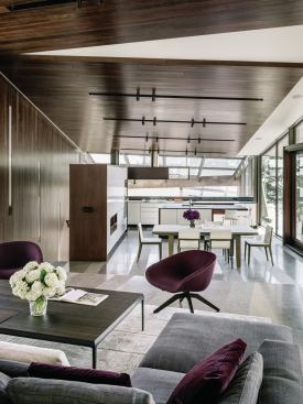 Fall House in Big Sur, by Endres Ware Architects Engineers, Fougeron Architecture, and Thomas George Constsruction, has a sequence of rooms that begins at the house’s uppermost level, with a building module that contains living, dining, and kitchen functions.