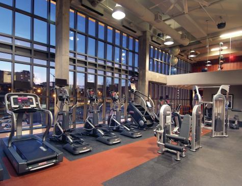 A two-story fitness center offers a cardio-theater and full-circuit strength training.