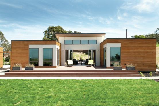 The exterior is clad in clear red cedar and composite siding. The expansive decks in the front and rear of the house are also made of a low-maintenance composite material.