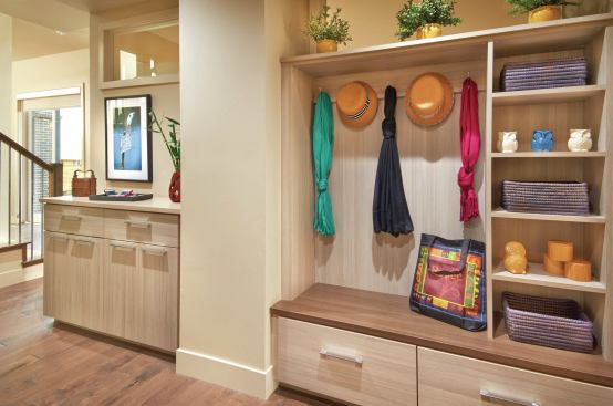 The alley-loaded rear garage accesses the house through a generous mudroom.