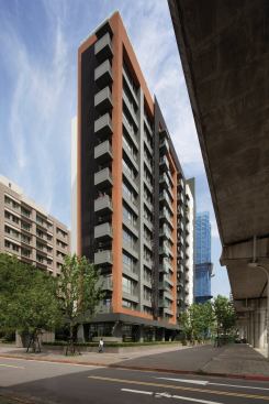 The narrow footprint accommodates balconies for each unit.