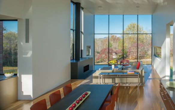 The view from the dining area through the living room extends to the Blue Ridge Mountains in the distance.
