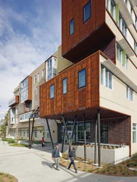 The site, adjacent to the freeway, required deft design so that the new building would fit in with its neighbors.