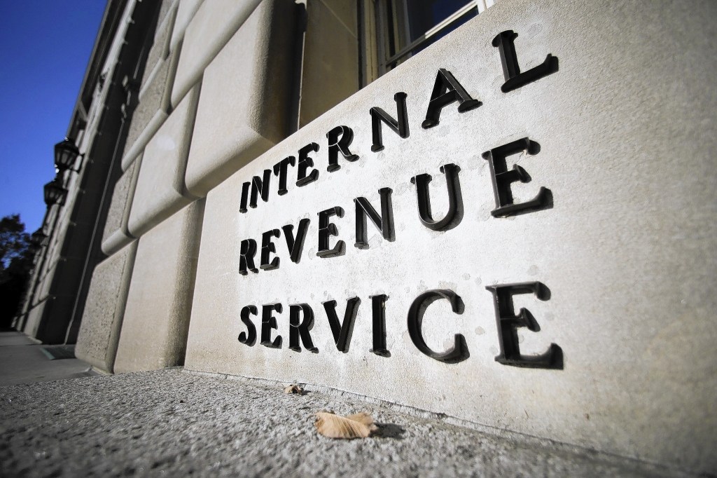 The Internal Revenue Service (IRS) building stands in Washington, D.C., U.S., on Tuesday, Nov. 13, 2012. President Barack Obama expressed confidence that he and Congress would reach an agreement that will avoid the automatic spending cuts and tax increases that are scheduled to occur at the end of the year. The fiscal cliff is the $607 billion combination of automatic spending cuts and tax increases scheduled to take effect in January. Lawmakers are trying to avert the cliff to prevent a short-term shock to the economy and reach an agreement on long-term deficit reduction. Photographer: Andrew Harrer/Bloomberg ** DP OUT, OS OUT, HOY OUT, TCN OUT **