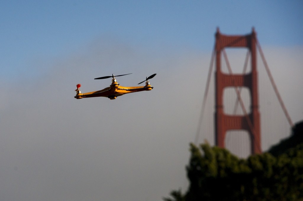 A drone flies in front of the Golden Gate Bridge during a demonstration at the Bloomberg Next Big Thing Summit in Sausalito, California, U.S., on Monday, June 9, 2014. The conference convenes tech's most important entrepreneurs, investors, and innovators for a discussion about what makes great tech leaders, successful companies, and disruptive products. Photographer: David Paul Morris/Bloomberg ** Usable by CT and LA Only **